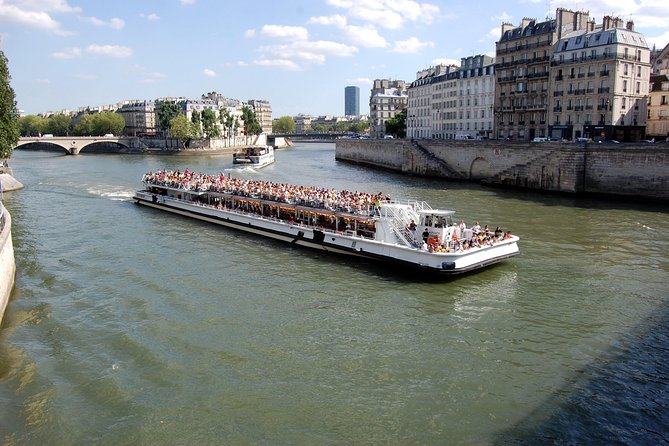 Day Trip to Paris with Eiffel Tower, Notre Dame and Louvre Museum - Eiffel Tower Visit: Second-Floor Views and Tight Time on Purpose