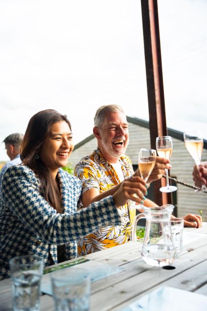 From London: Vintage Bus Wine Tour with Return Train Tickets - Stop One in Sussex: Guided Vineyard Tour + Hamper Lunch Among the Vines