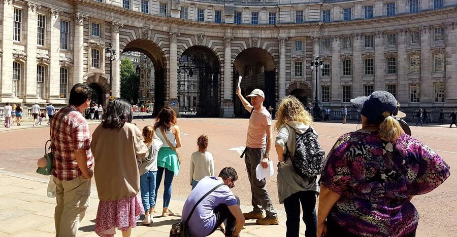London: 30 Top City Sights Guided Group Walking Tour - Trafalgar Square and Whitehall: government, monuments, and quick photo windows