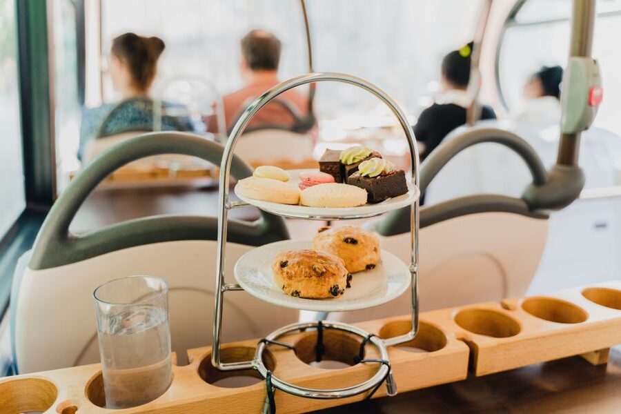 London: Afternoon Tea Bus with a Glass of Prosecco - What’s on your tray: sandwiches, scones, cakes, and your drink