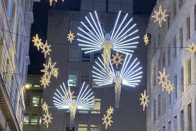 London Christmas Lights Guided Tour With Christmas Music - Seven Dials: fairy-light canopy overhead