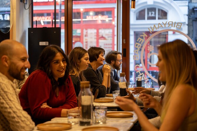 London Food Walking Tour: World Flavours in Soho & Chinatown - Mediterranean Cafe Stop: Hummus, Dolma, and Halloumi