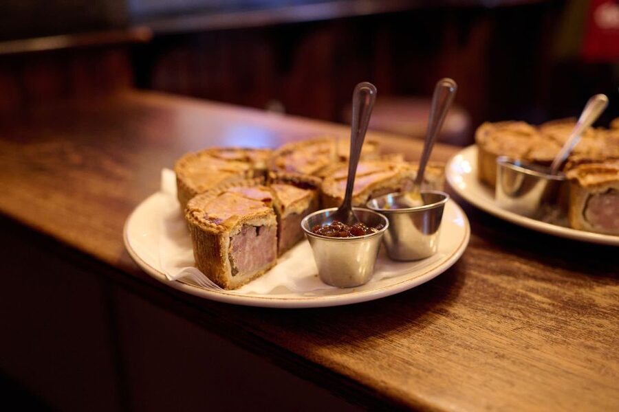 London: Historic Pubs, British Ales & Classic Dishes - The Old Bell Tavern on Fleet Street: Sweeney Todd, cider, and sausage roll comfort