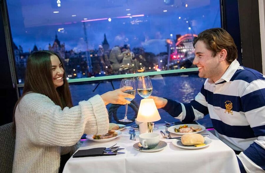 London: River Thames Dinner Cruise with Live Jazz - Your table setup: fixed seating, shared space, and window views