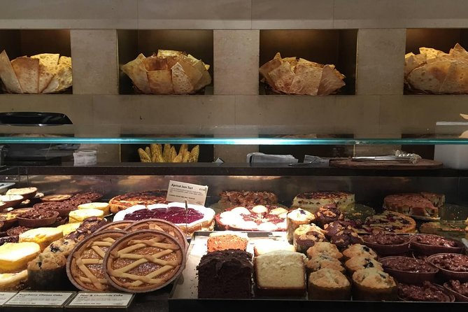 London’s Sweet Treats And Desserts Tour with a Local Tailored to Your Tastes - Stop 5: Mayfair afternoon tea setup while you explore