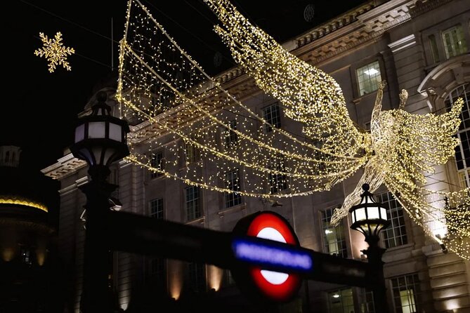 Magical London Christmas Lights Walking Tour with a Londoner - Piccadilly Circus: digital billboards meet Christmas lights