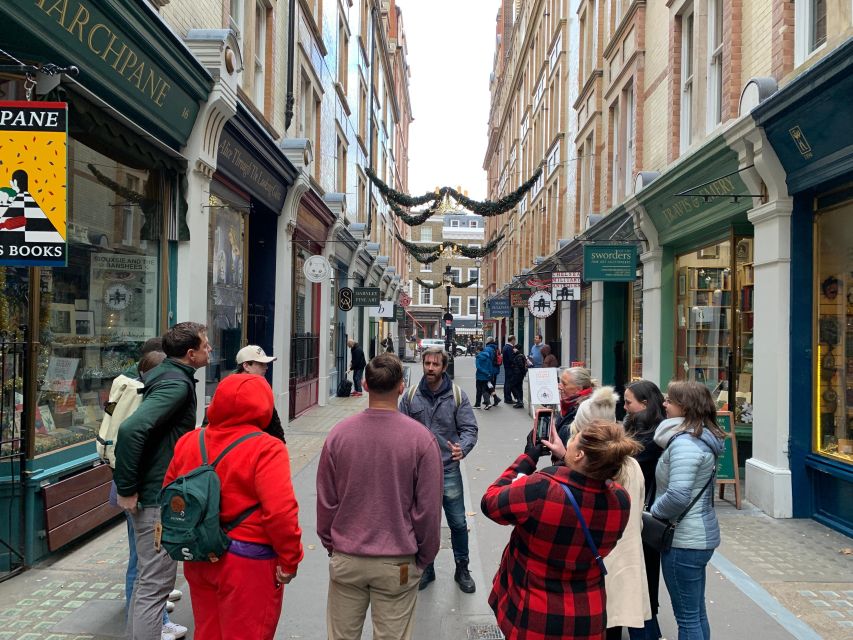 Magical Movies: London Harry Potter Tour - Meeting Point and the Start: Shaftesbury Fountain and an orange-umbrella guide