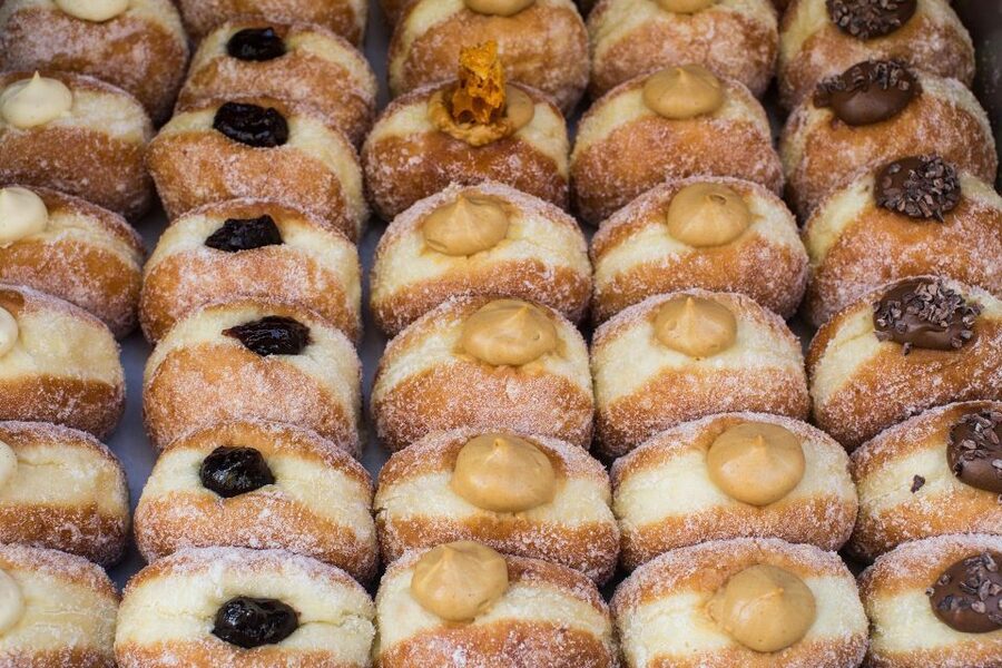 The Authentic Walking Tour with Indian Tasting Meal - Spitalfields Market: fashion, faith changes, and Bengali street signs
