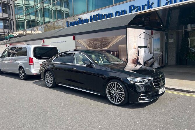 Transfer from Heathrow Airport to London hotel on private car - Wi‑Fi, water, and an air-conditioned ride through London traffic
