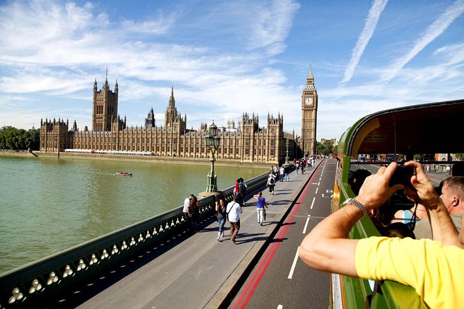 Vintage London Bus Tour Including Cruise with London Eye Option - The Thames cruise from Tower Pier toward the London Eye: best view-per-minute