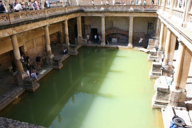 Windsor Castle, Bath and Stonehenge Tour - Roman Baths: the hot-spring centerpiece and dusk lighting